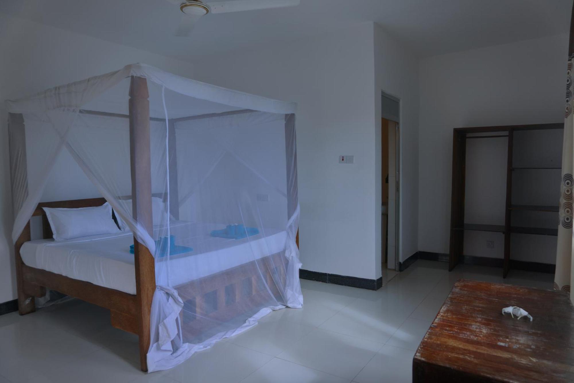 Cocolala Beach House Нунгви Номер фото