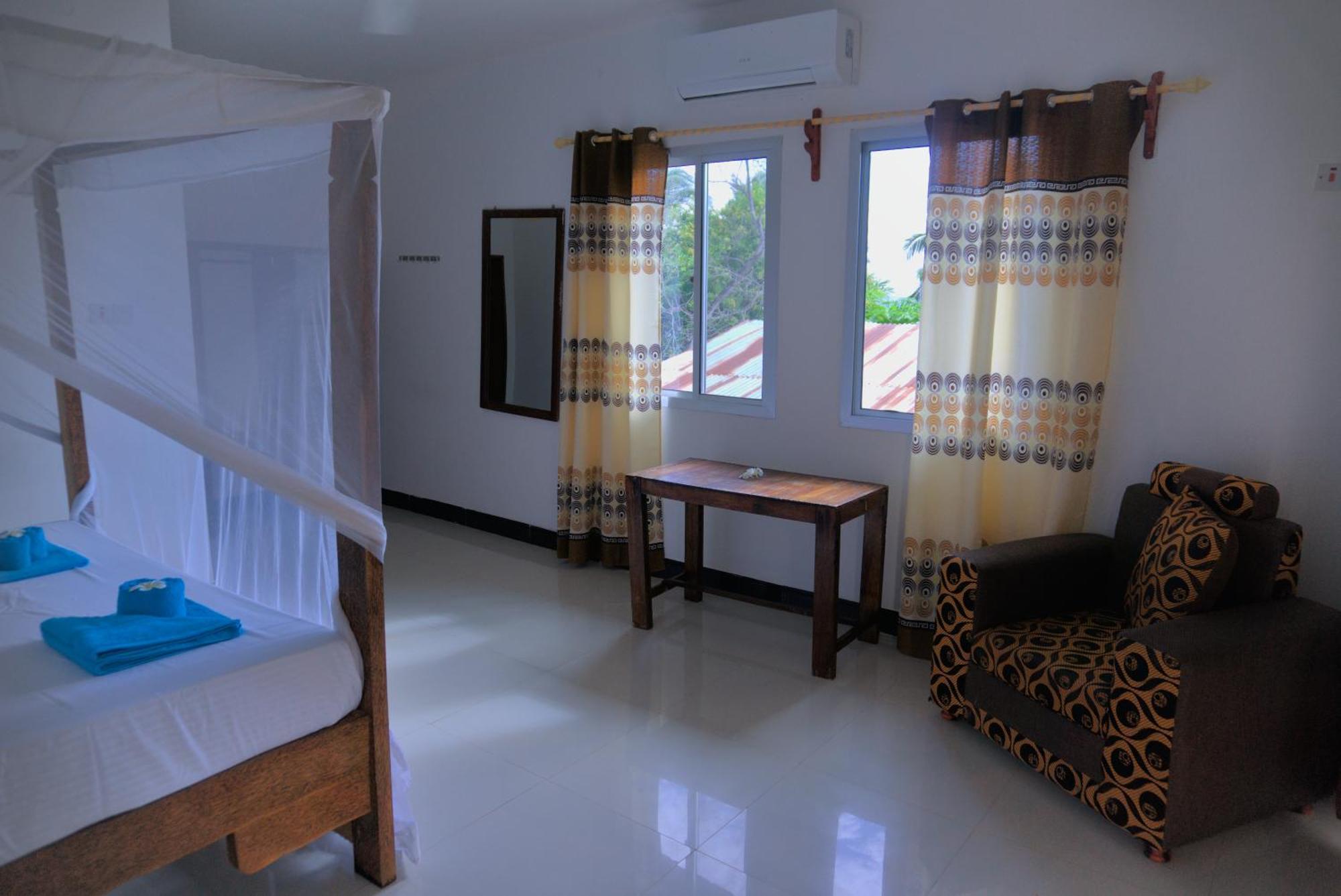 Cocolala Beach House Нунгви Номер фото